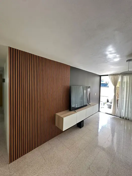 TV feature wall with decorative panels — Finished