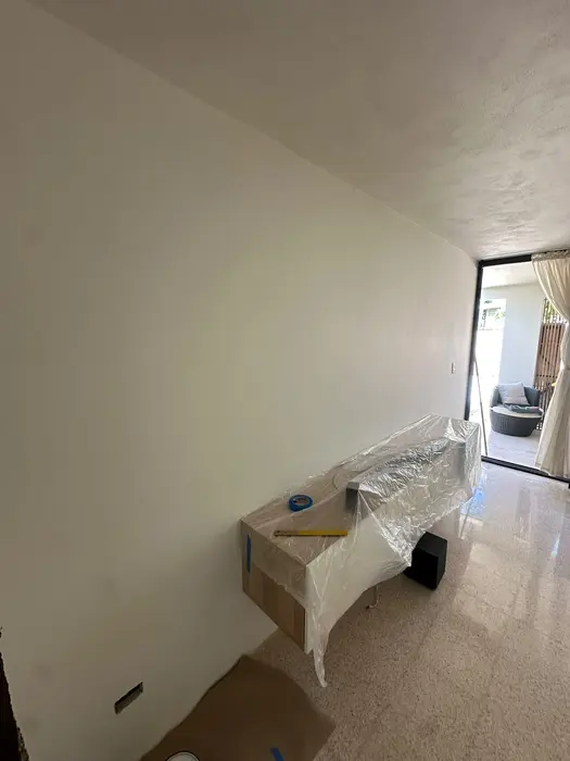 TV feature wall with decorative panels — Before